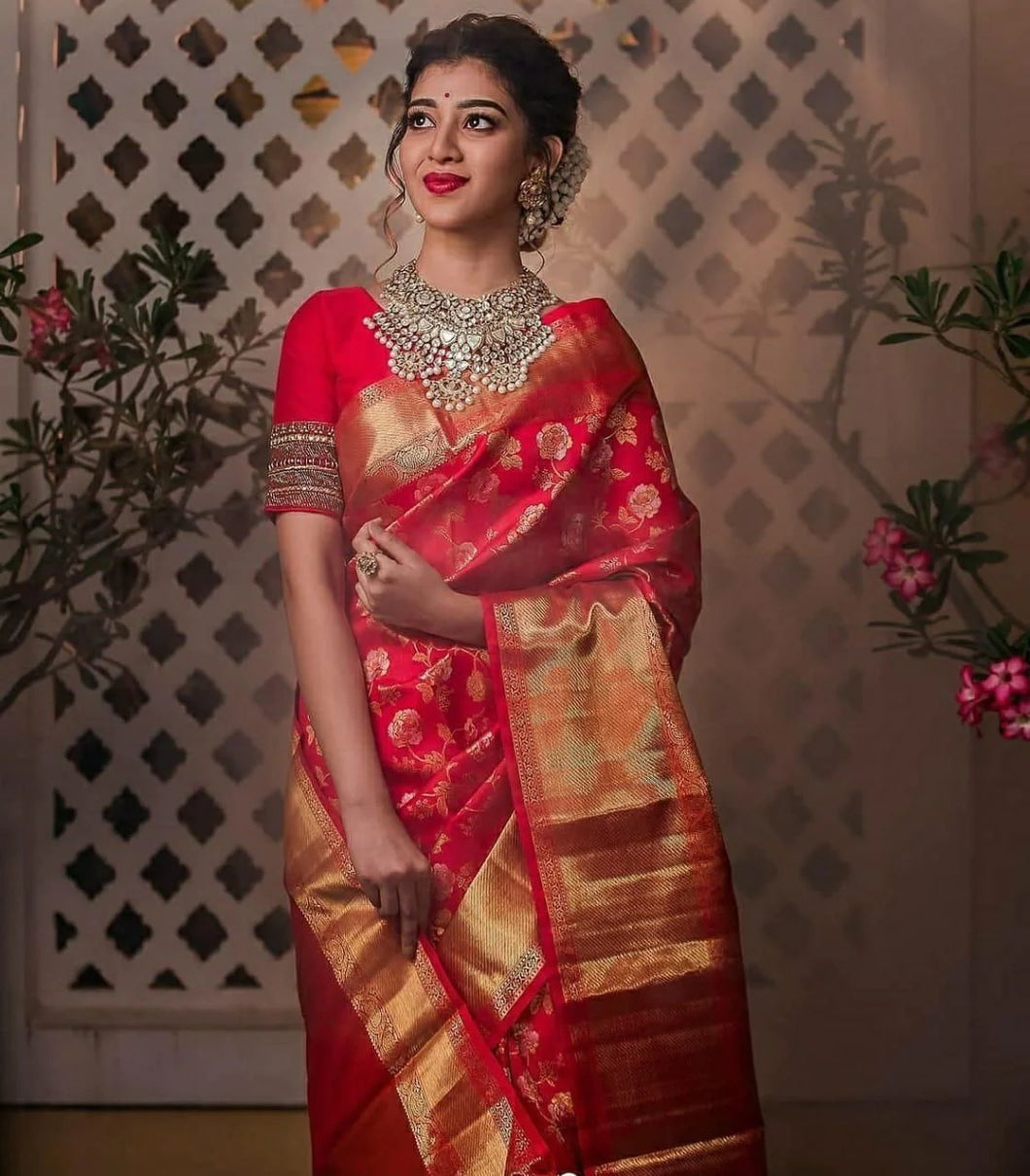 Bewitching Red Soft Banarasi Silk Saree With Stunner Blouse Piece