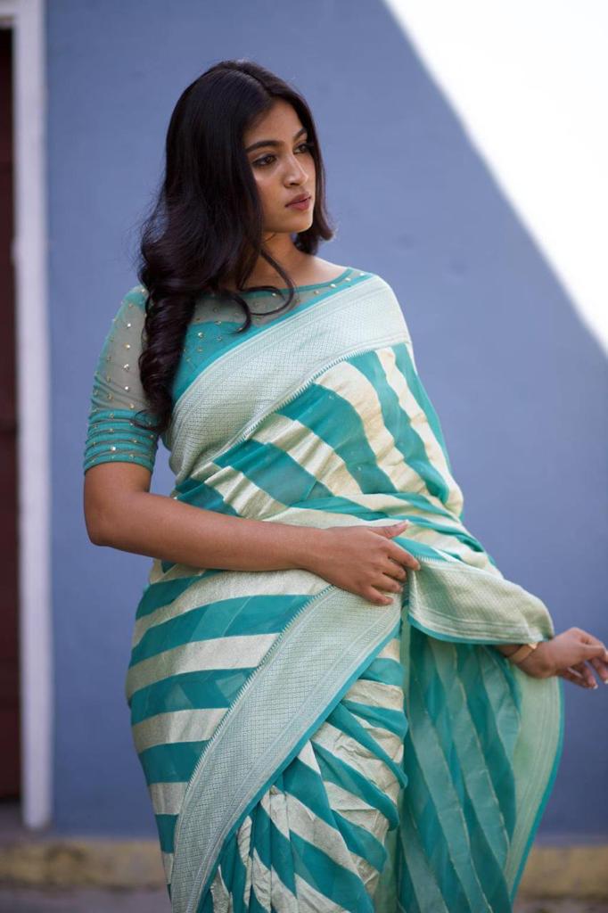 Kala Niketan Mesmeric Turquoise Soft Banarasi Silk Saree With Blissful Turquoise Blouse Piece